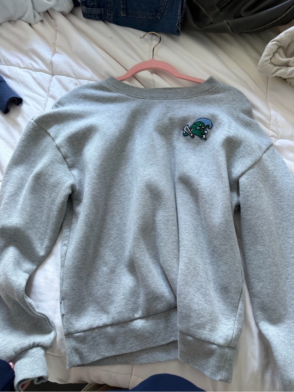 From tulane merch store sweatshirt, size medium defo runs smaller like a small
